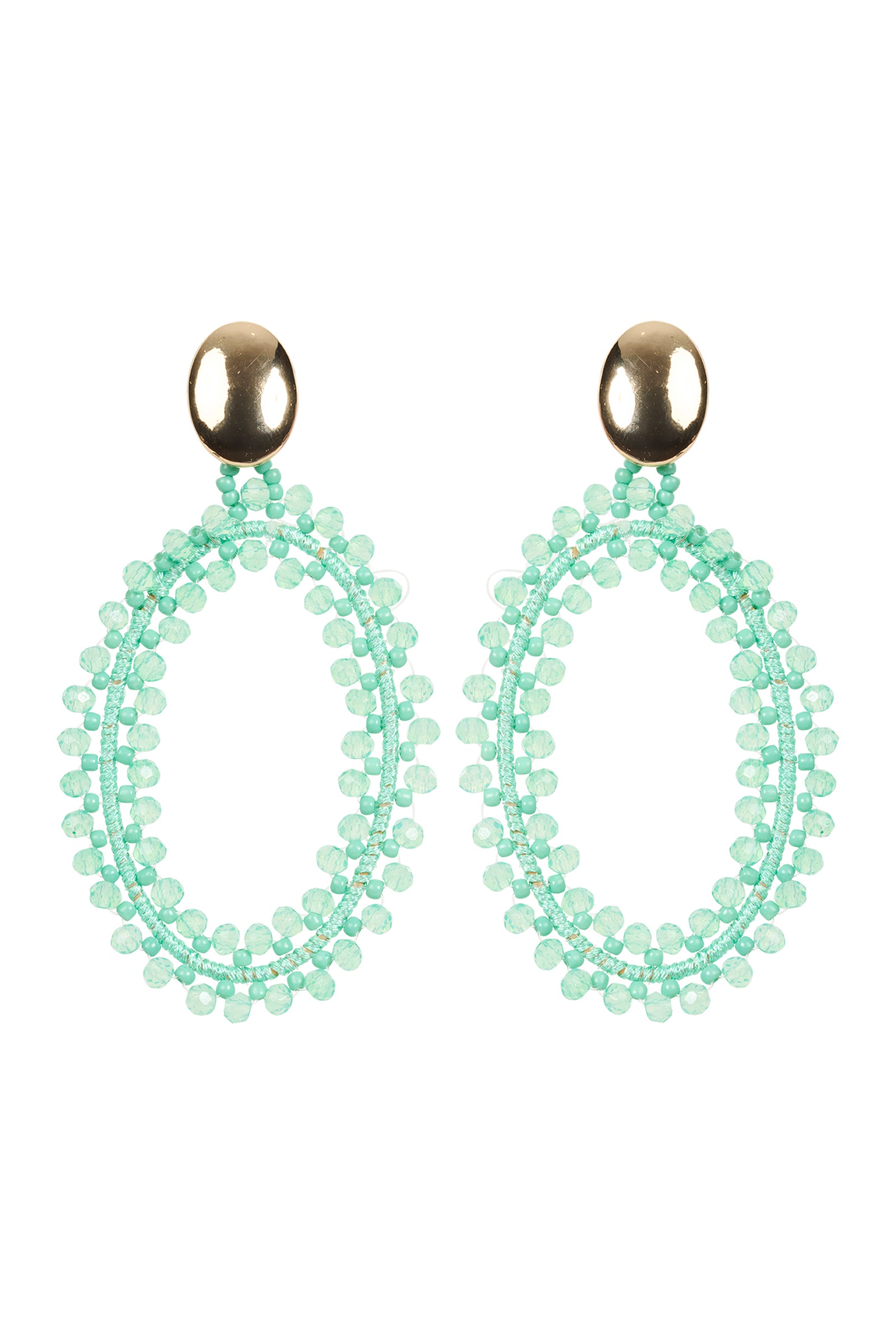 Pair of turquoise beaded hoop earrings on a white background